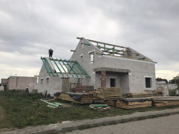Двухэтажный дом с мансардой