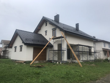 Двухэтажный дом с мансардой